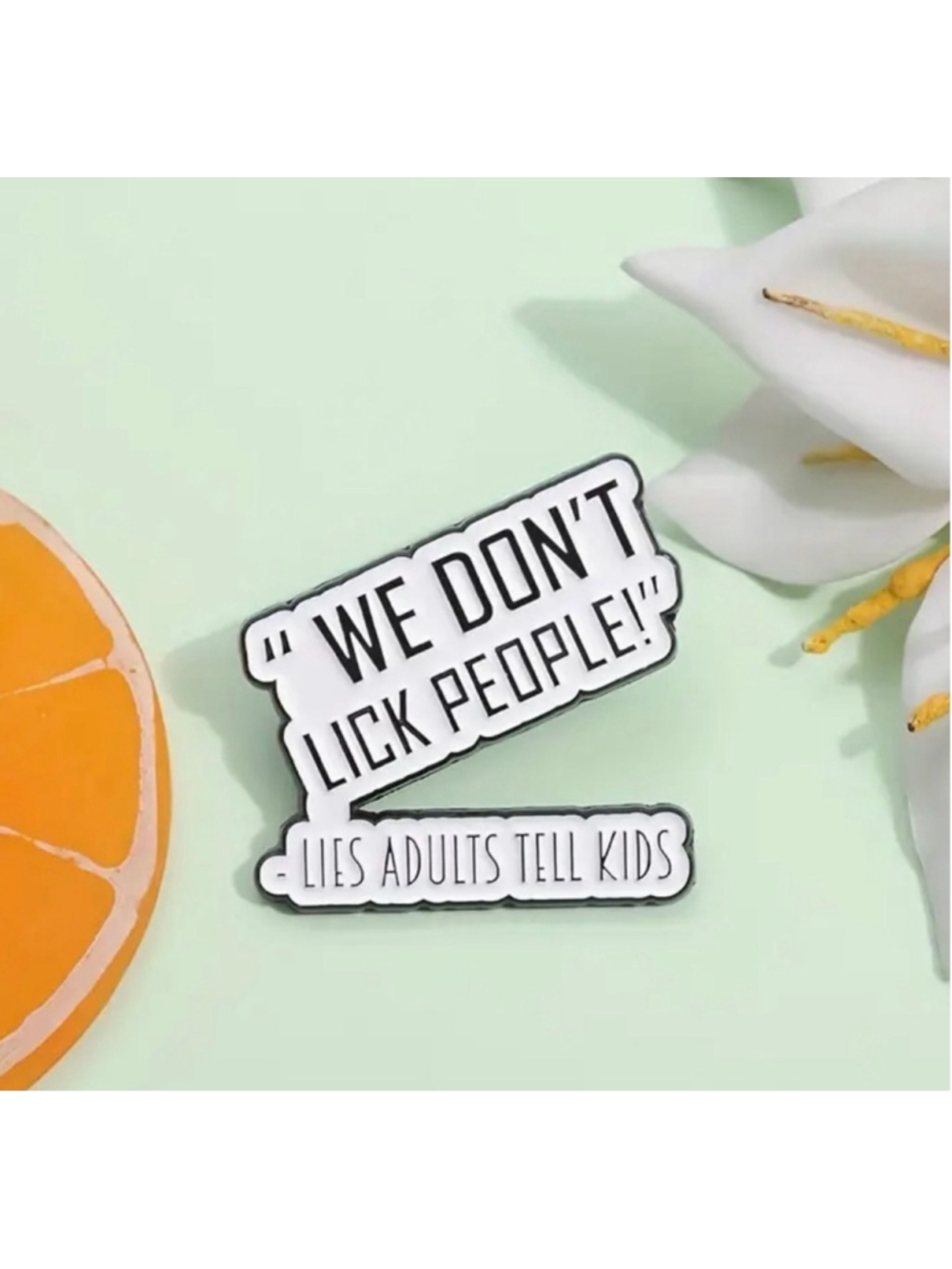 Funny “We Don’t Lick People” Enamel Pin